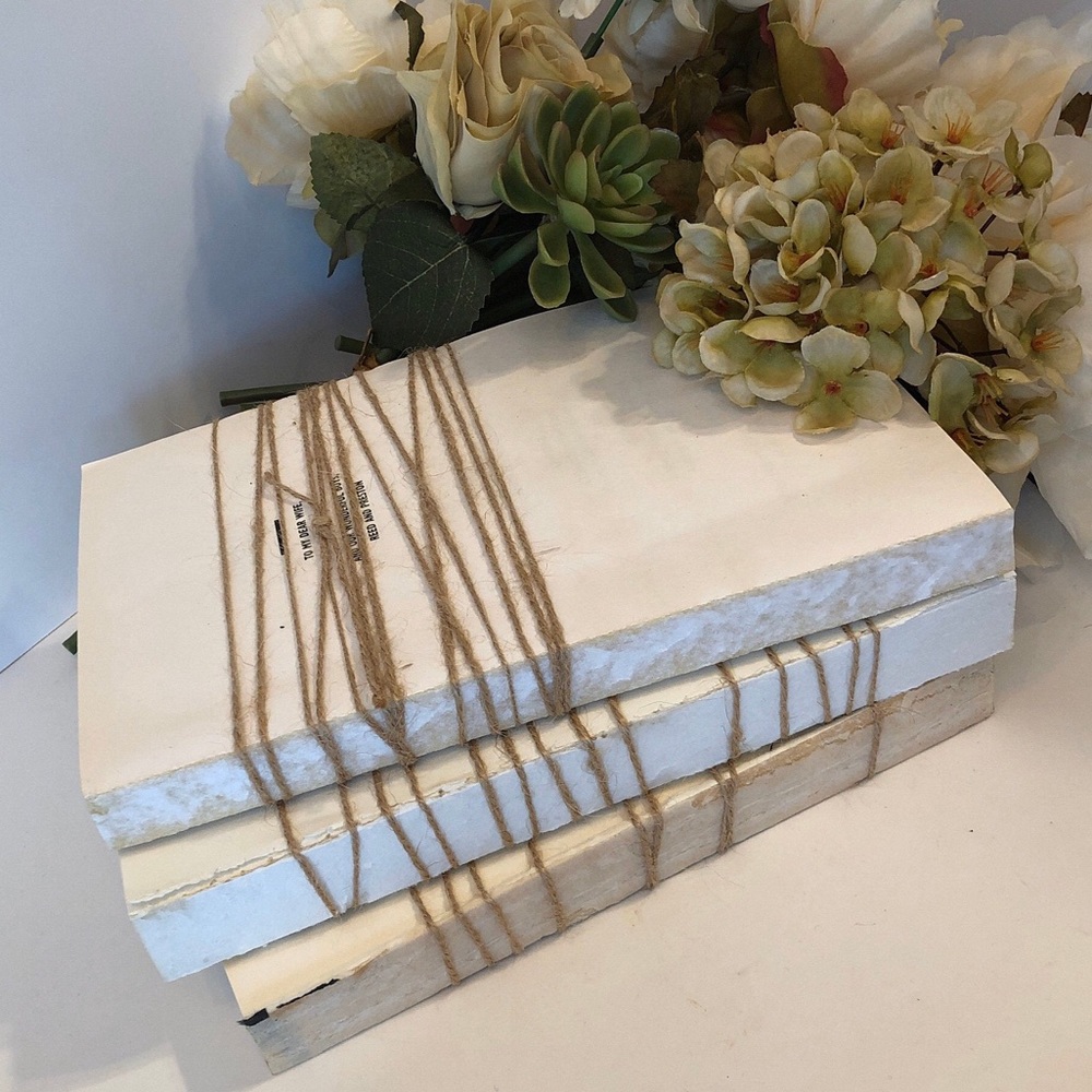 Set of three unbound box wrapped in twine
